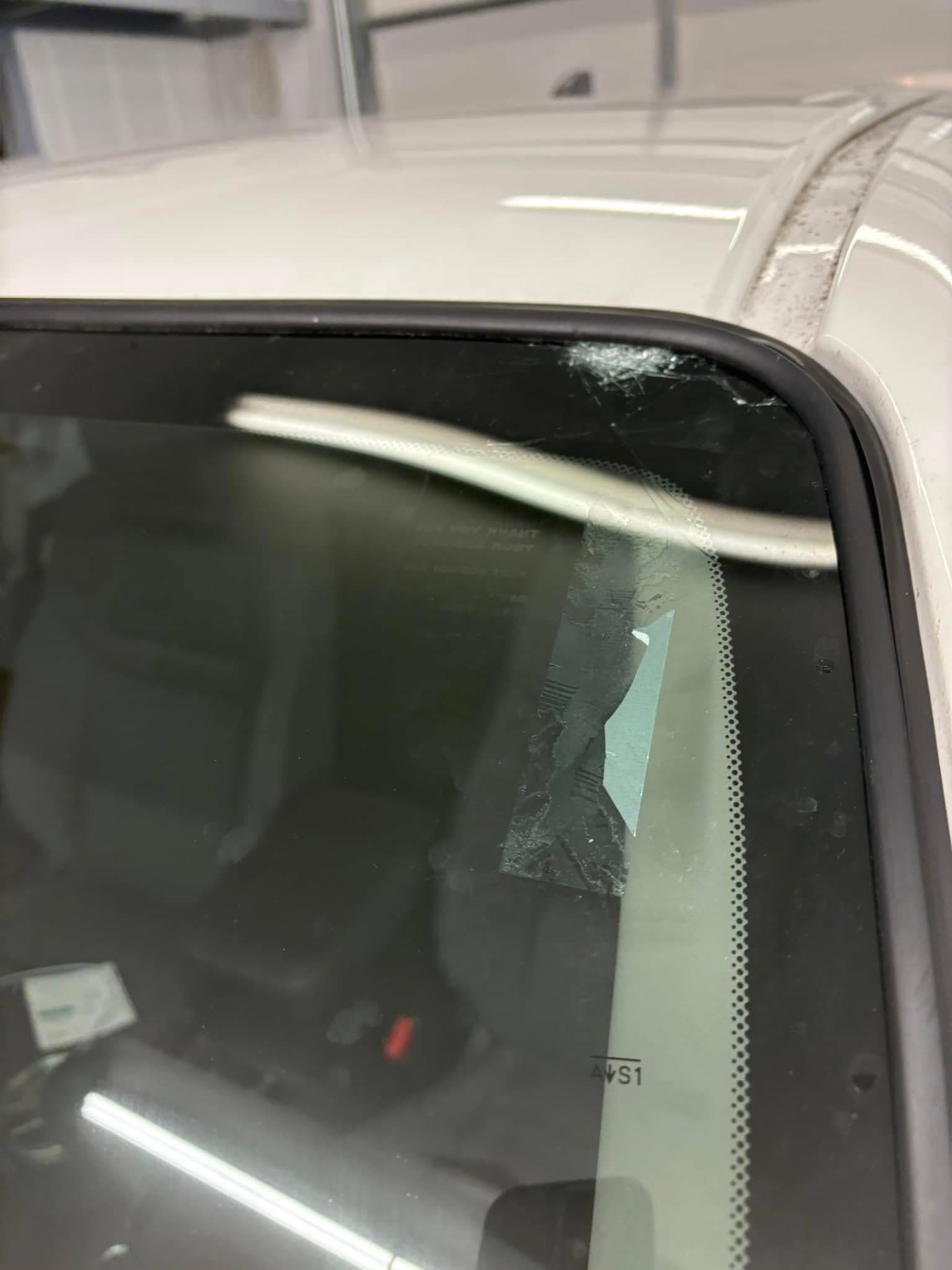 windshield — white truck — before